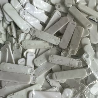 Small Wear plates for profile suction tubes with plugs for textile compact spinning machine parts